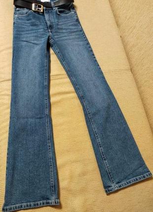 Джинсы клеш