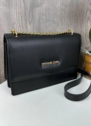 Милая и стильная женская мини сумочка в стиле майкл корс черная3 фото