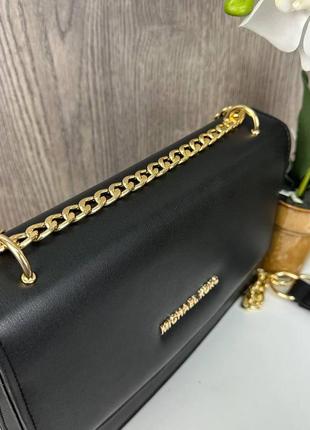Милая и стильная женская мини сумочка в стиле майкл корс черная5 фото