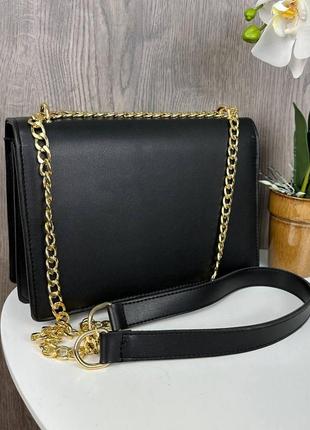 Милая и стильная женская мини сумочка в стиле майкл корс черная6 фото