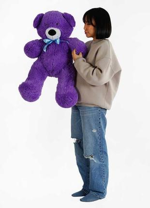 Гр м`яка іграшка "ведмедик" колір фіолетовий в96830 висота 1 м (1)