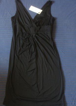 Платье черное с лифом «на запах» и воланом1 фото