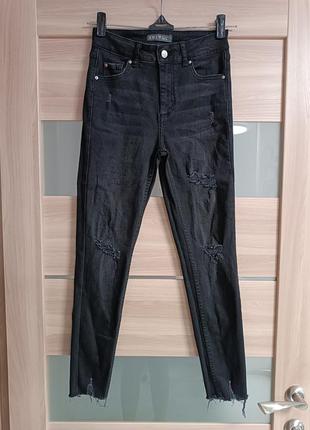 Стильні джинси з невеликими потертостями2 фото