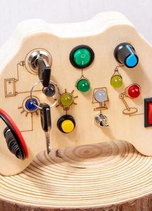 Монтессорі інтерактивна іграшка бізіборд геймпад дерев'яний3 фото