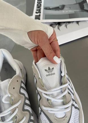 Adidas ozweego white reflective
рефлективні кросівки демі унісекс жіночі чоловічі білі весна осінь кроссовки демисезонные белые с рефлективом3 фото