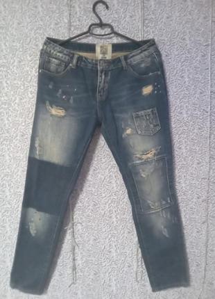 Оригінальні якісні джинси з ефектом зістарювання,розмір s