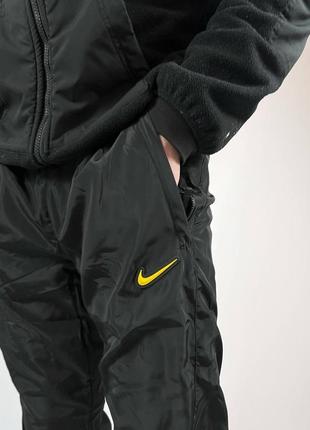 Штани нейлон nike nocta4 фото