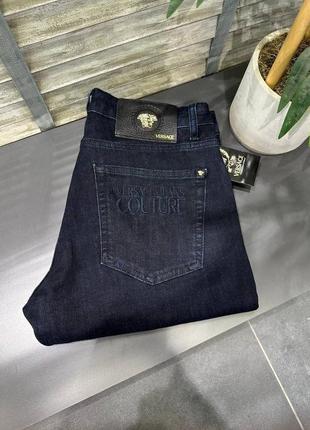Джинси в стилі versace