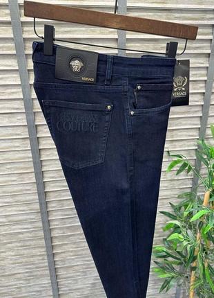Джинси в стилі versace