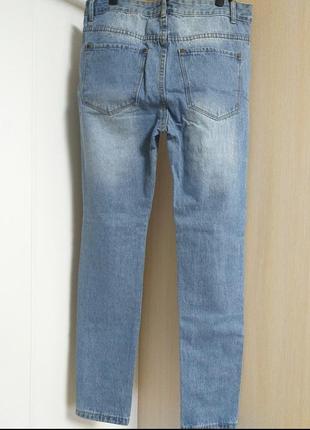 Мужские рваные синие джинсы4 фото