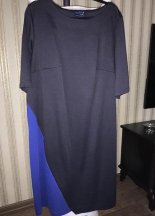 Платье из темно-синего трикотажа с ассиметричной вставкой1 фото