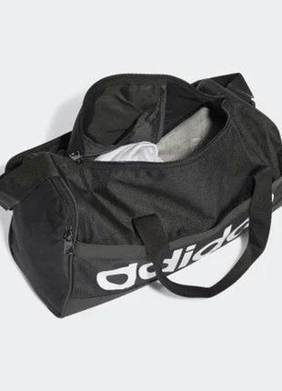 Сумка essentials linear duffel extra small performance ht47434 фото