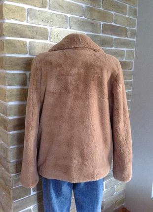 Новая стильная меховая мягусенькая курточка шубка размер 10-124 фото