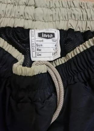 Штани спортивні нейлонові плащівка into black колір чорний смуга stripes весна літо zip карго оригінал original7 фото