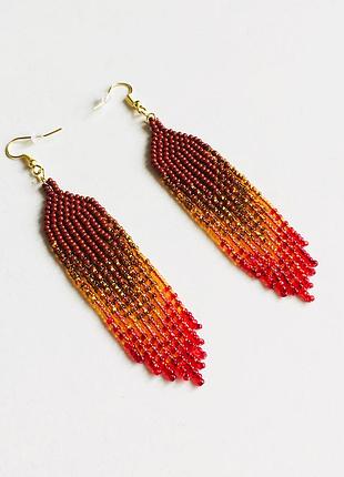 Довгі коричнево-червоні бісерні сережки з бахромою