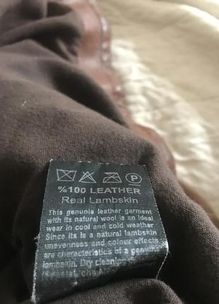 Шкіряна італійська куртки з заводськими дирками5 фото