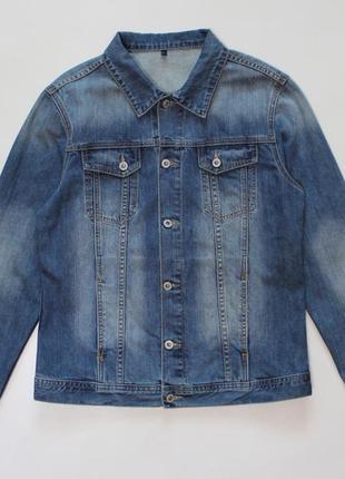 Стильна приталена джинсова куртка з висвітленнями від c&a1 фото