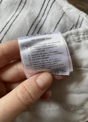 Білі лляні короткі шорти у смужку