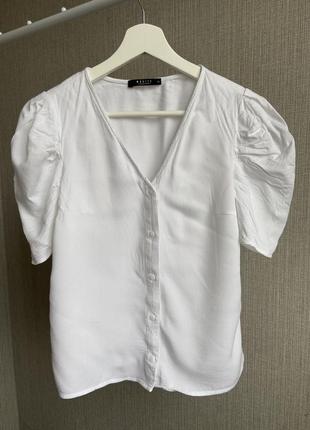 Біла кофтина на ґудзиках блузка