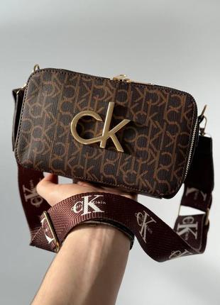 Жіноча сумка в стилі ck pull calvin klein коричнева сумочка
