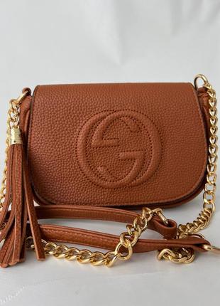 Сумка gucci с фирменной канвой