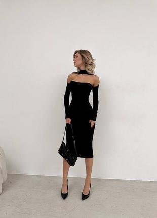 Трендова стильна сукня міді з вирізом8 фото
