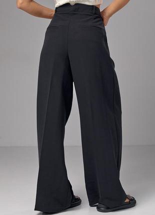 Жіночі широкі штани-палаццо зі стрілками та високою посадкою2 фото