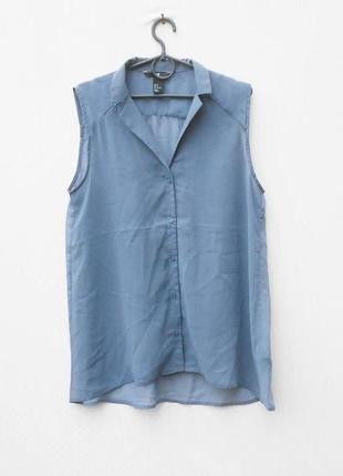 Легкая блузка с воротником без рукавов