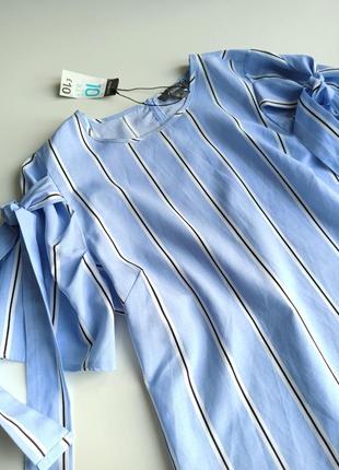 Красива стильна блуза у вертикальну смужку з оригінальними рукавами5 фото