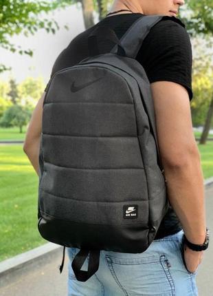 Рюкзак темный меланж с черным логотипом7 фото