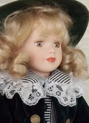 Фарфоровая кукла коллекционная1 фото