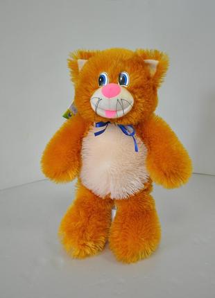 Мягкая игрушка .  котик 42 х 25