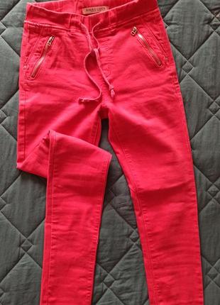 Червоні терті джинси1 фото