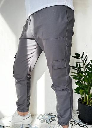 Мужские весенние брюки с карманами из коттона.4 фото