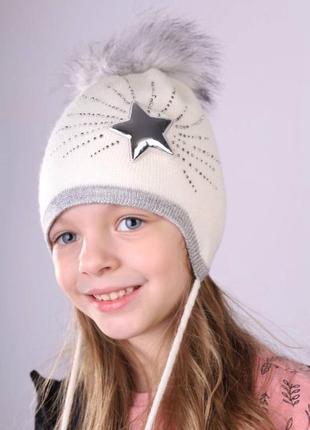 Зимова шапка на дівчинку