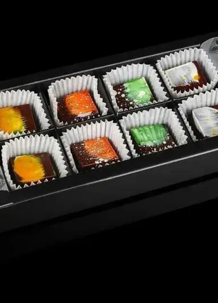 Набір цукерок шоколадно-горіхової колекції на подарунок «pastella» чорний шоколад 8 шт1 фото