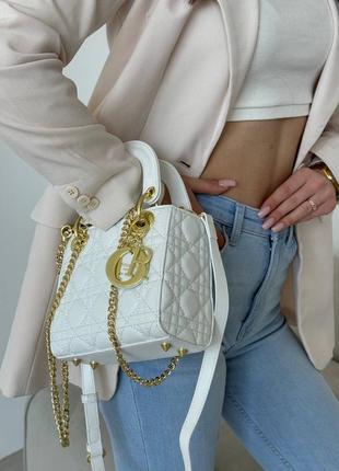 Крута жіноча сумочка білого кольору хорошої якості10 фото