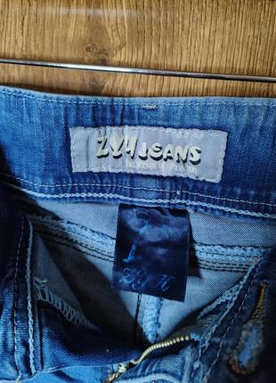 Короткі джинсові жіночі шорти9 фото