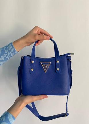 Жіноча сумка з двома ремінцями , якісна зручна в яскравому кольорі, guess total blue2 фото