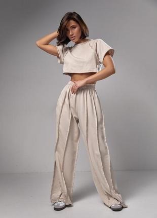 Жіночій якісний трикотажний літній трендовий костюм: укорочений топ і широкі штани baggy гранж2 фото