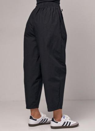 Жіночі бежеві літні укорочені трендові штани банани з кишенями бріджи2 фото