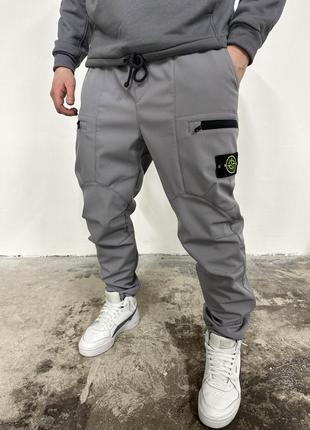 Серые спортивные мужские штаны stone island