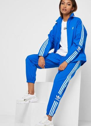 Нейлонові спортивні штани adidas1 фото