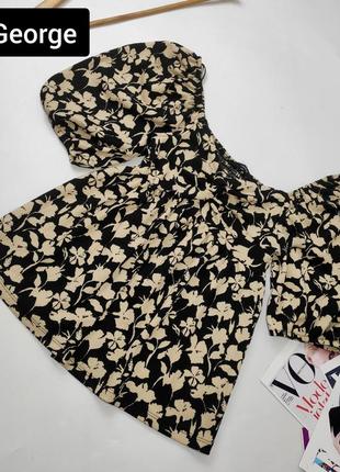 Блуза жіноча чорно бежевого кольору в квітковий принт з короткими рукавами від бренду george xs1 фото