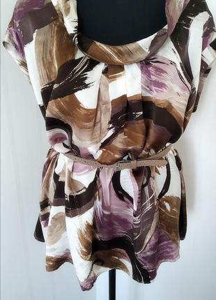 Шелковая блуза с абстрактным принтом.1 фото