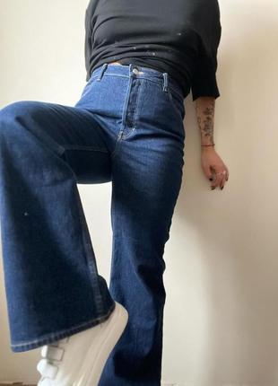 Щільні джинси кльош2 фото