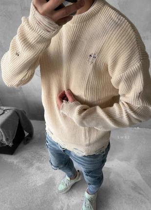 Бежевий стильний светр оверсайз рваний2 фото
