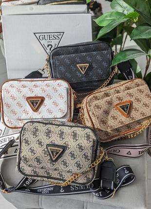 Сумочка guess кросс-боді з зовнішньою кишенею1 фото