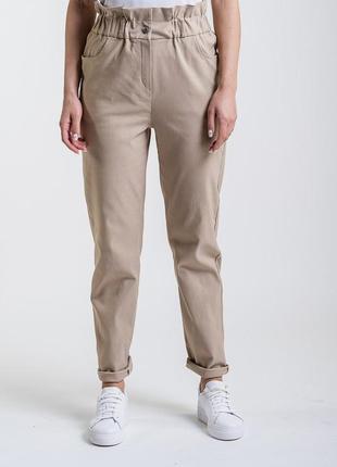 Женские брюки с оборкой вверху и с карманами сзади1 фото