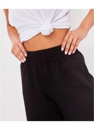 Жіночі штани труби кльош від стегна туреччина котон петля чорний10 фото